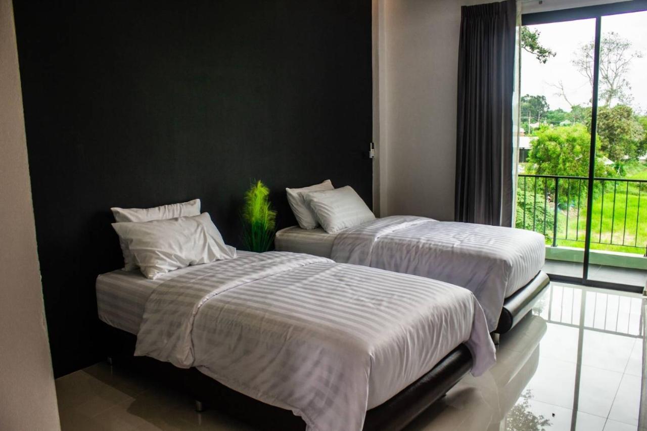 Hotel De Vine House Roi Et Esterno foto